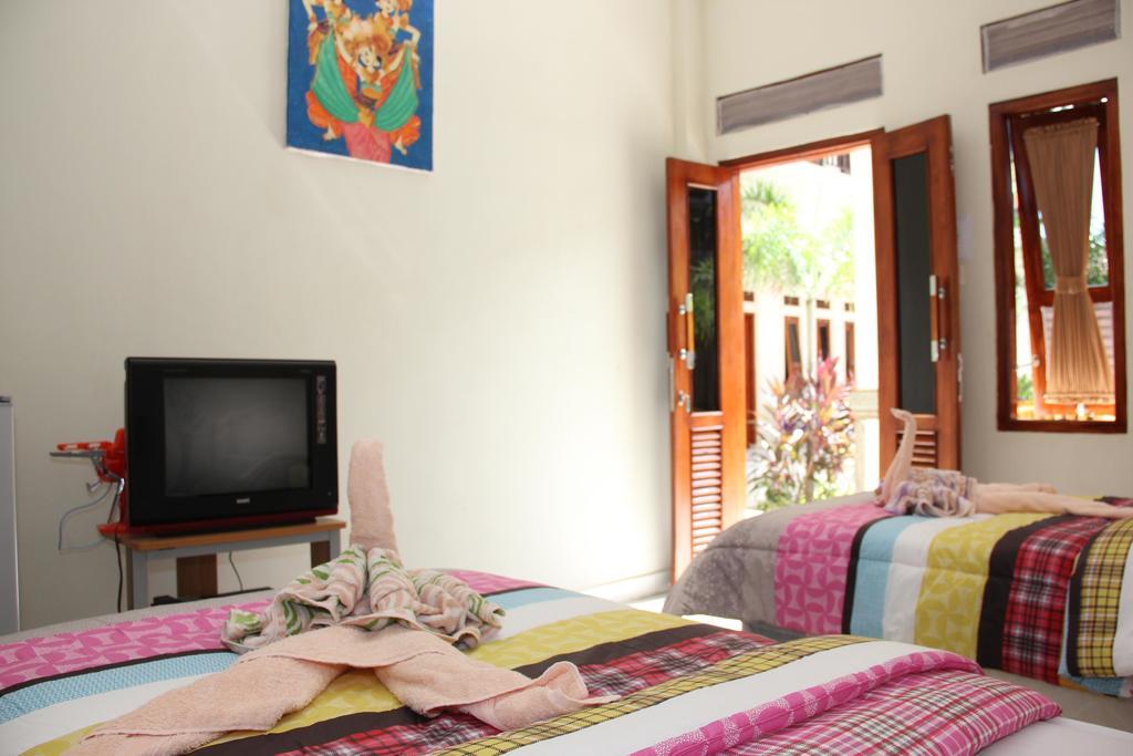Апартаменты Warung Coco Poppies 2 Кута Номер фото
